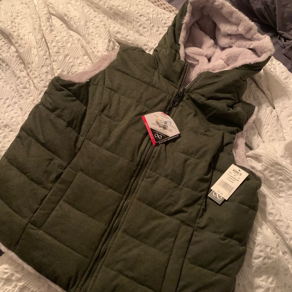 Very warm reversible faux fur vest! NWT